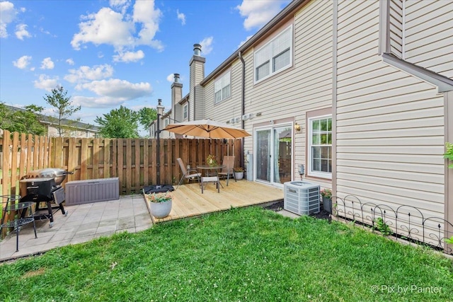 521 Nebraska Cir, Carol Stream, IL 60188 - back of property featuring a deck and a patio area
