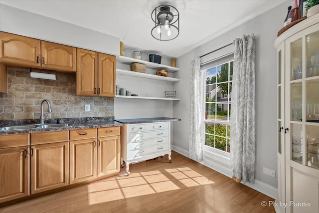 521 Nebraska Cir, Carol Stream, IL 60188 - kitchen with decorative backsplash, light wood finished floors, open shelves, and brown cabinetry