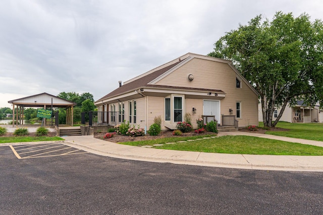 1937 Bayview Ln Unit 0, Aurora, IL 60506 - view of front of house featuring uncovered parking and a front yard