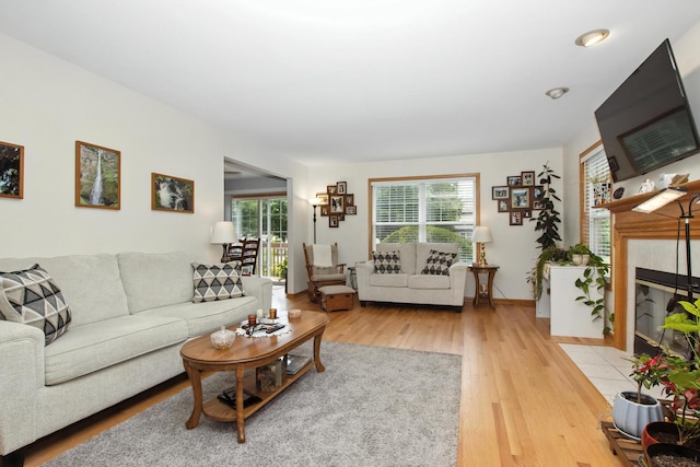 406 Kresswood Dr, Mchenry, IL 60050 - living area with a fireplace and light wood finished floors