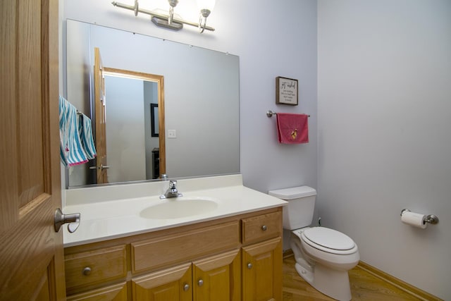 12532 Suffield Dr, Palos Park, IL 60464 - half bathroom featuring vanity and wood finished floors