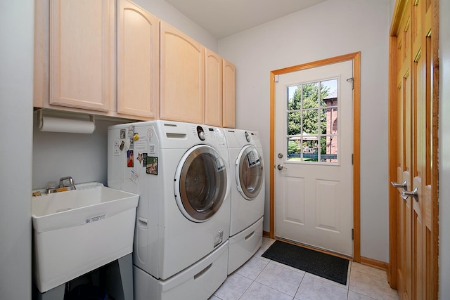 12532 Suffield Dr, Palos Park, IL 60464 - laundry room featuring washing machine and clothes dryer, cabinet space, and light tile patterned flooring