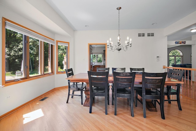 12532 Suffield Dr, Palos Park, IL 60464 - dining space with light wood-style flooring and a chandelier