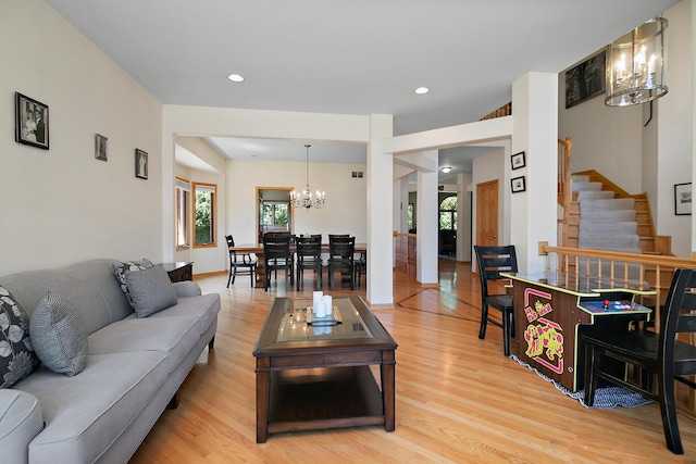 12532 Suffield Dr, Palos Park, IL 60464 - living room featuring a chandelier, plenty of natural light, light wood-type flooring, stairs, and recessed lighting