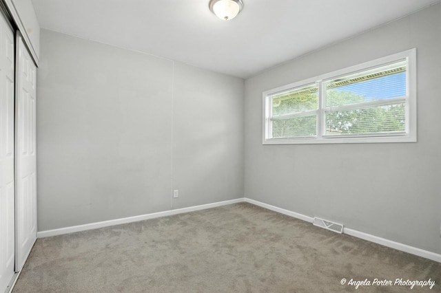 4420 Clearview Dr, Mchenry, IL 60050 - unfurnished bedroom featuring carpet flooring and a closet