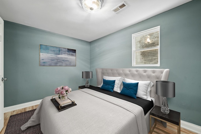 2345 S Lawndale Ave, Chicago, IL 60623 - bedroom with wood finished floors