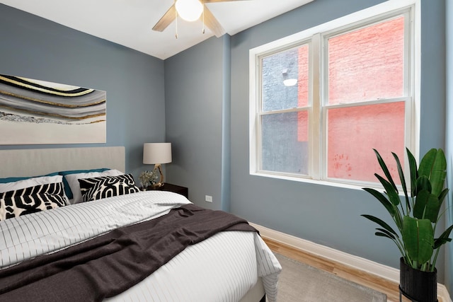 2345 S Lawndale Ave, Chicago, IL 60623 - bedroom featuring wood finished floors and baseboards