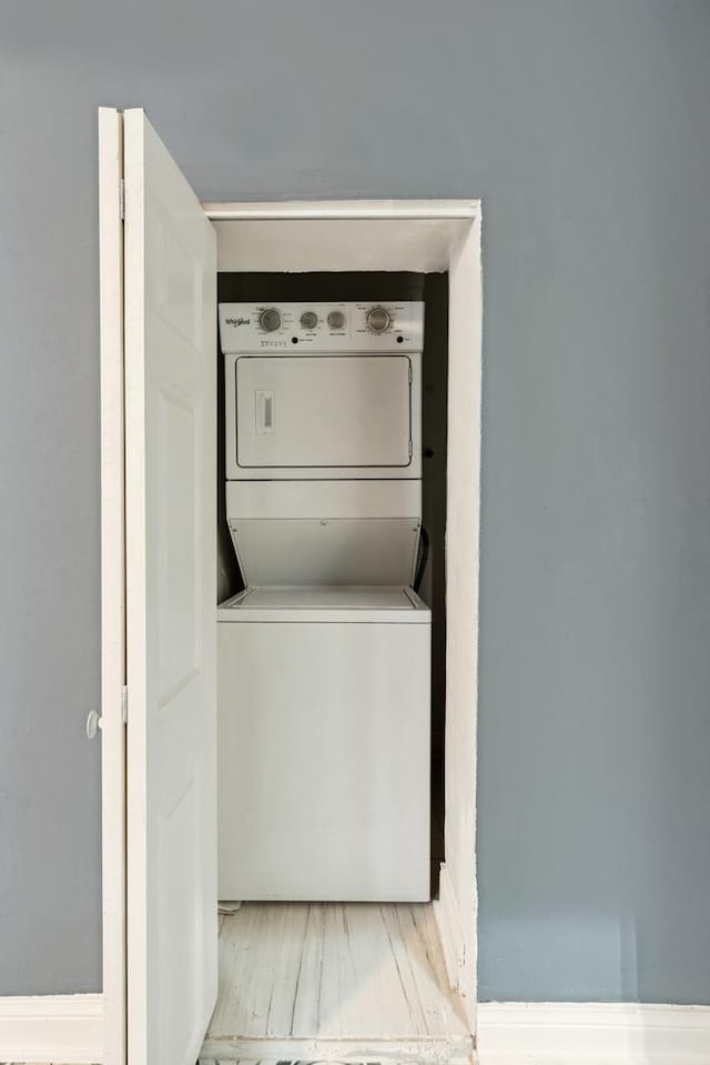 2345 S Lawndale Ave, Chicago, IL 60623 - laundry room featuring estacked washer and dryer
