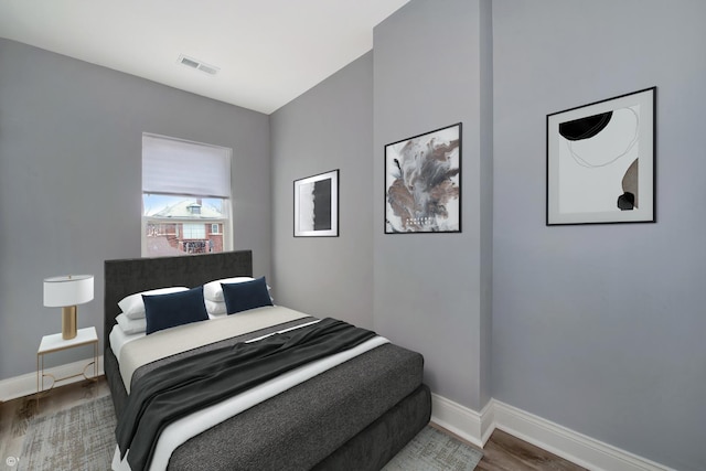2345 S Lawndale Ave, Chicago, IL 60623 - bedroom featuring wood finished floors and baseboards