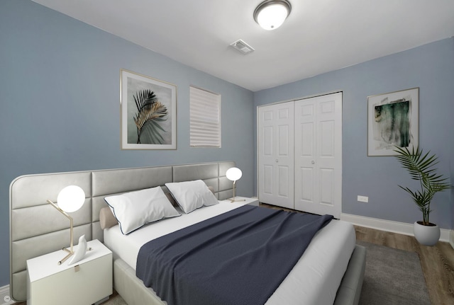 2345 S Lawndale Ave, Chicago, IL 60623 - bedroom featuring wood finished floors and a closet