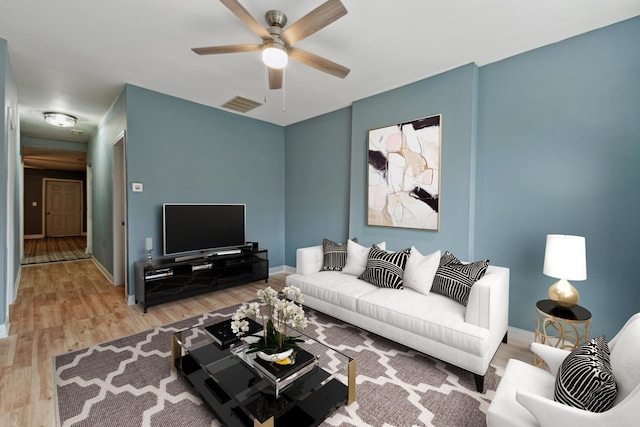 2345 S Lawndale Ave, Chicago, IL 60623 - living room featuring ceiling fan and light wood finished floors