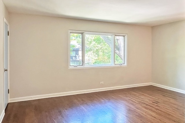423 Edgewood Pl Unit 2, River Forest, IL 60305 - spare room with dark wood-style floors and baseboards