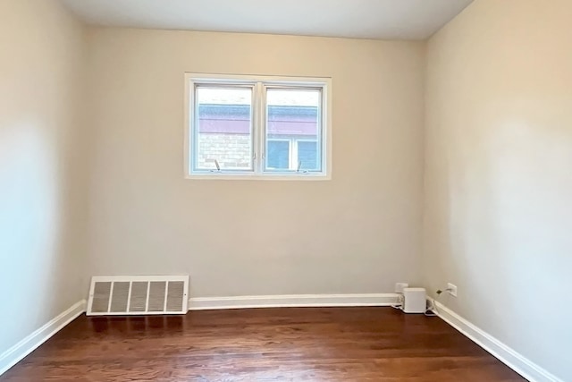 423 Edgewood Pl Unit 2, River Forest, IL 60305 - spare room featuring wood finished floors and baseboards