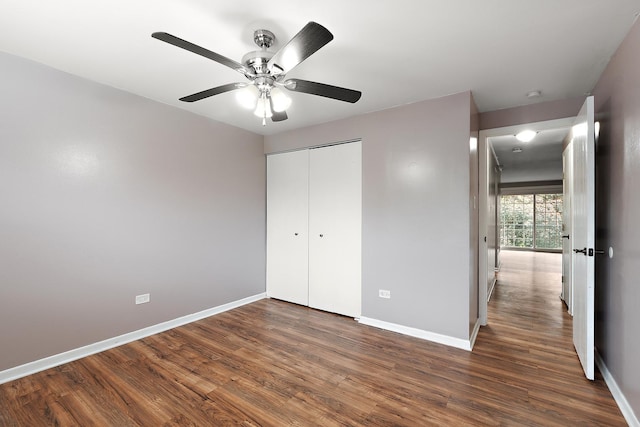 9815 Nottingham Ave Unit 201, Chicago Ridge, IL 60415 - unfurnished bedroom featuring wood finished floors, a closet, and a ceiling fan