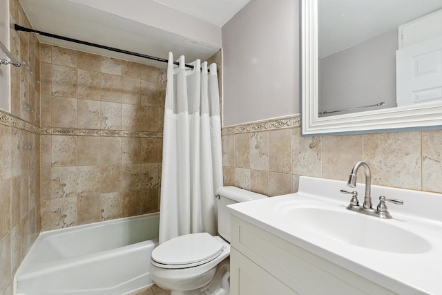 9815 Nottingham Ave Unit 201, Chicago Ridge, IL 60415 - full bath featuring vanity, shower / tub combo with curtain, tile walls, and a wainscoted wall