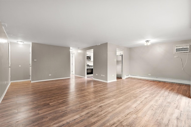 9815 Nottingham Ave Unit 201, Chicago Ridge, IL 60415 - unfurnished living room featuring baseboard heating, wood finished floors, and a wall mounted AC