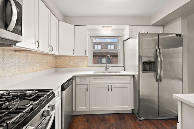 9815 Nottingham Ave Unit 201, Chicago Ridge, IL 60415 - kitchen featuring appliances with stainless steel finishes, dark wood-type flooring, white cabinets, light countertops, and tasteful backsplash