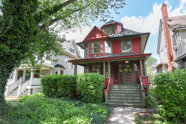 125 S Ridgeland Ave, Oak Park, IL 60302 - victorian home featuring covered porch and stairway