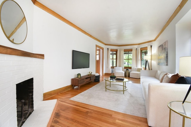 125 S Ridgeland Ave, Oak Park, IL 60302 - living area with wood-type flooring, a fireplace, and ornamental molding