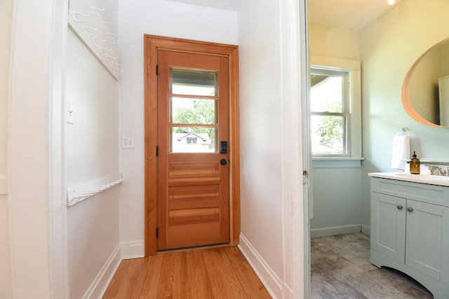 125 S Ridgeland Ave, Oak Park, IL 60302 - doorway featuring a sink and baseboards