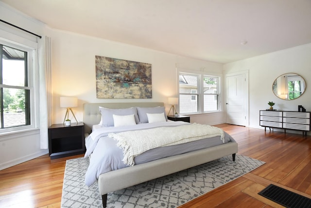 125 S Ridgeland Ave, Oak Park, IL 60302 - bedroom with wood finished floors and baseboards