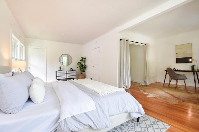 125 S Ridgeland Ave, Oak Park, IL 60302 - bedroom with light wood-style floors and multiple windows