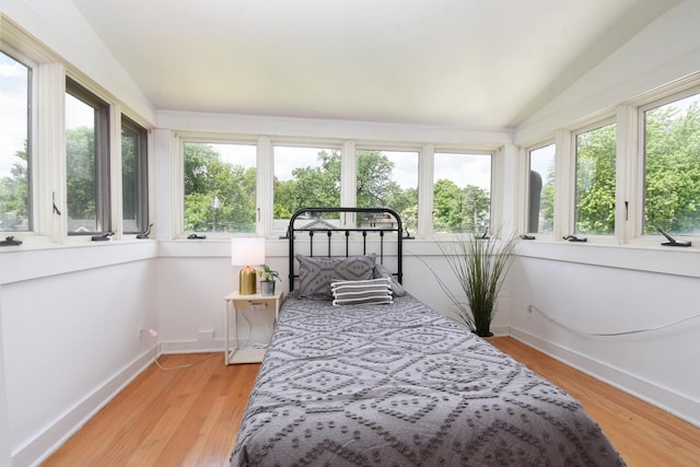 125 S Ridgeland Ave, Oak Park, IL 60302 - bedroom with lofted ceiling and light wood finished floors