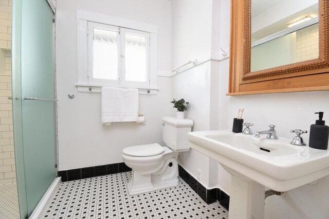 125 S Ridgeland Ave, Oak Park, IL 60302 - full bathroom with baseboards and a shower stall
