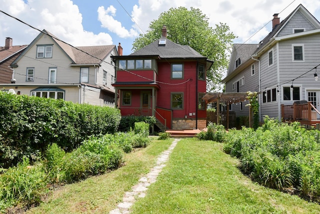 125 S Ridgeland Ave, Oak Park, IL 60302 - back of property with a pergola, a yard, and a deck