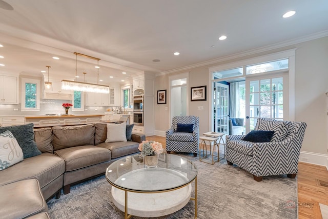 525 Meadow Ln, Libertyville, IL 60048 - living room with light wood-style flooring, ornamental molding, recessed lighting, and healthy amount of natural light