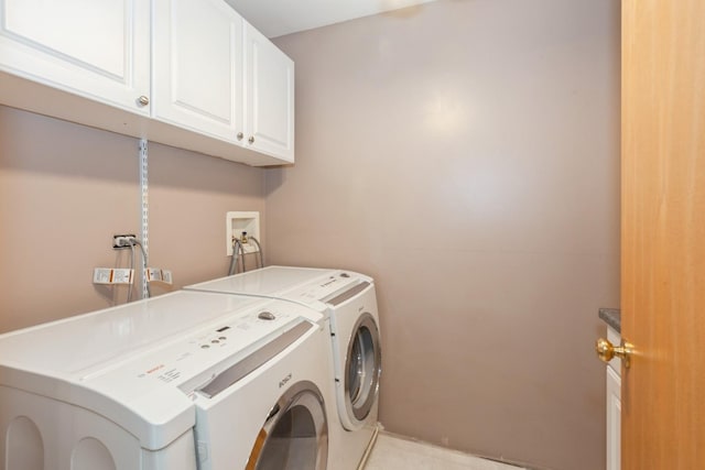 28 Primrose Ln, Oswego, IL 60543 - washroom featuring cabinet space and independent washer and dryer