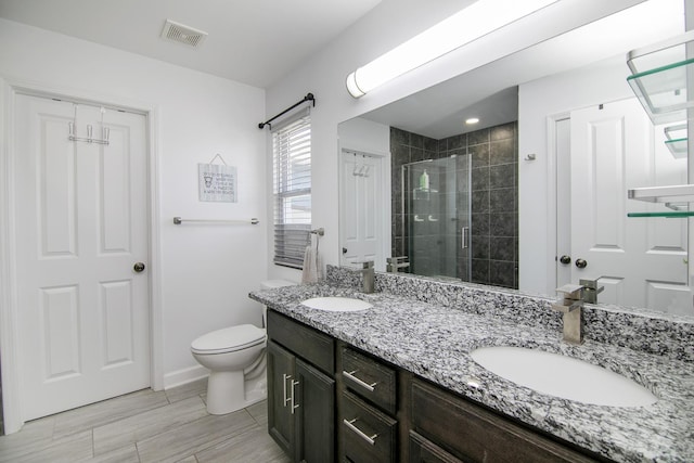 1867 Robert Dr, Bourbonnais, IL 60914 - full bathroom with double vanity and a stall shower