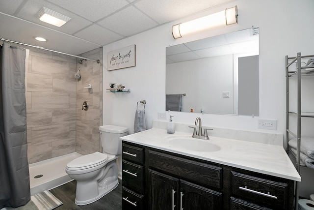 1867 Robert Dr, Bourbonnais, IL 60914 - full bath with vanity, a paneled ceiling, tiled shower, and wood finished floors