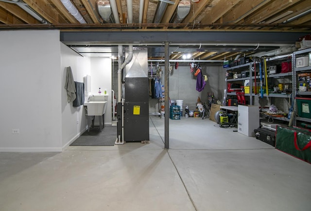 1867 Robert Dr, Bourbonnais, IL 60914 - unfinished below grade area featuring heating unit and a sink