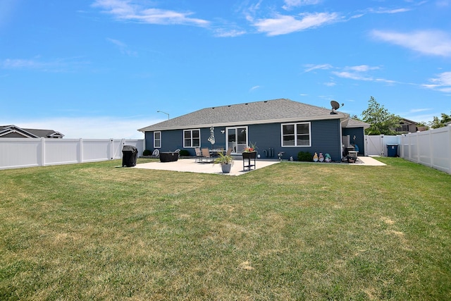 1867 Robert Dr, Bourbonnais, IL 60914 - rear view of house featuring a patio, a fenced backyard, a gate, and a shingled roof