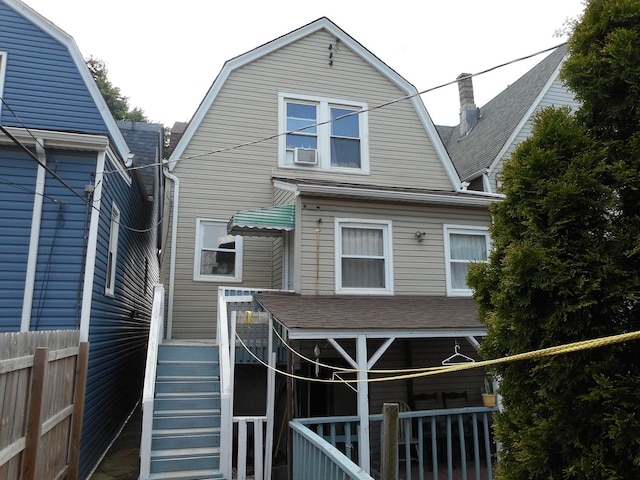 2820 W 36th St, Chicago, IL 60632 - rear view of house with a gambrel roof and a shingled roof