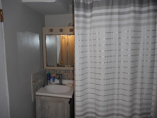 2820 W 36th St, Chicago, IL 60632 - bathroom with vanity, decorative backsplash, and a shower with shower curtain