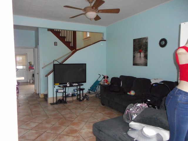 2820 W 36th St, Chicago, IL 60632 - living room featuring a ceiling fan, light tile patterned floors, and stairs