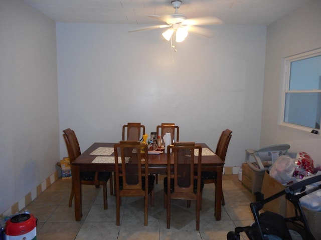 2820 W 36th St, Chicago, IL 60632 - dining area featuring a ceiling fan and light tile patterned floors