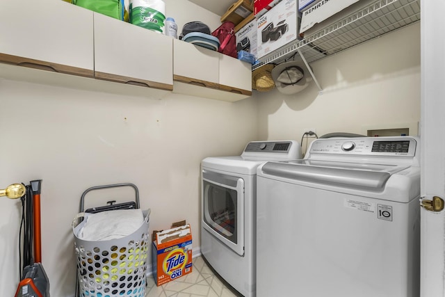 1028 Wynnfield Ct Unit C, Elgin, IL 60120 - washroom featuring cabinet space and separate washer and dryer