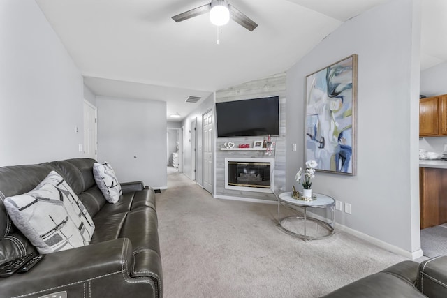 1028 Wynnfield Ct Unit C, Elgin, IL 60120 - living room featuring a ceiling fan, carpet floors, vaulted ceiling, and a large fireplace