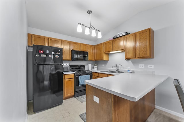 1028 Wynnfield Ct Unit C, Elgin, IL 60120 - kitchen featuring black appliances, lofted ceiling, light countertops, a peninsula, and brown cabinets