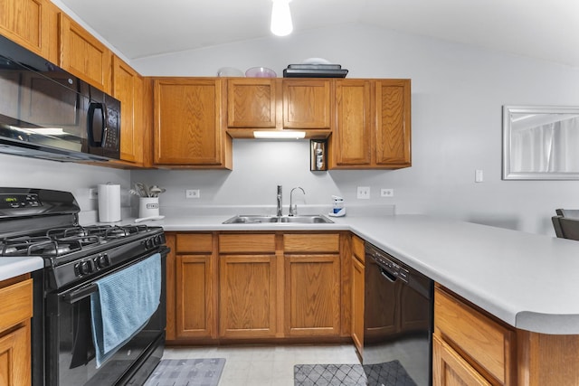 1028 Wynnfield Ct Unit C, Elgin, IL 60120 - kitchen featuring black appliances, lofted ceiling, light countertops, and brown cabinets
