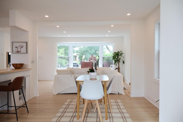 2913 N Kolmar Ave, Chicago, IL 60641 - dining room featuring light wood-type flooring and recessed lighting