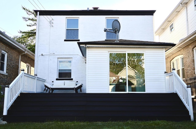 2913 N Kolmar Ave, Chicago, IL 60641 - rear view of property featuring a wooden deck