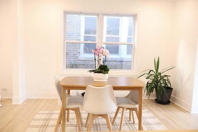 2913 N Kolmar Ave, Chicago, IL 60641 - dining space featuring light wood finished floors