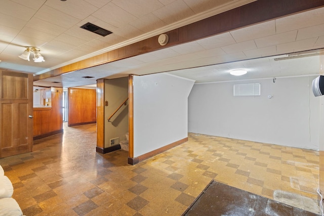 5144 W Saint Paul Ave, Chicago, IL 60639 - basement with tile patterned floors and crown molding