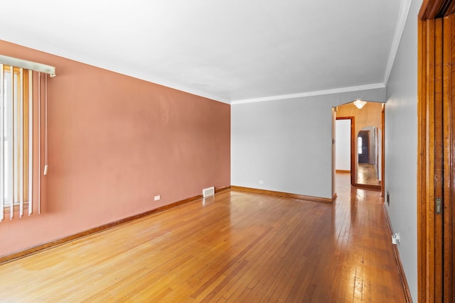 5144 W Saint Paul Ave, Chicago, IL 60639 - empty room featuring wood-type flooring and crown molding