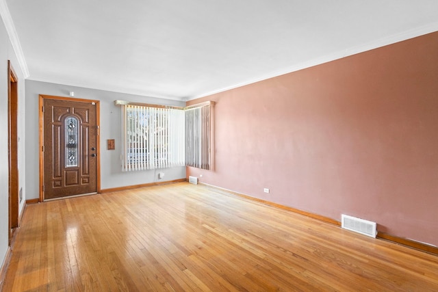 5144 W Saint Paul Ave, Chicago, IL 60639 - entryway with light wood-type flooring and ornamental molding