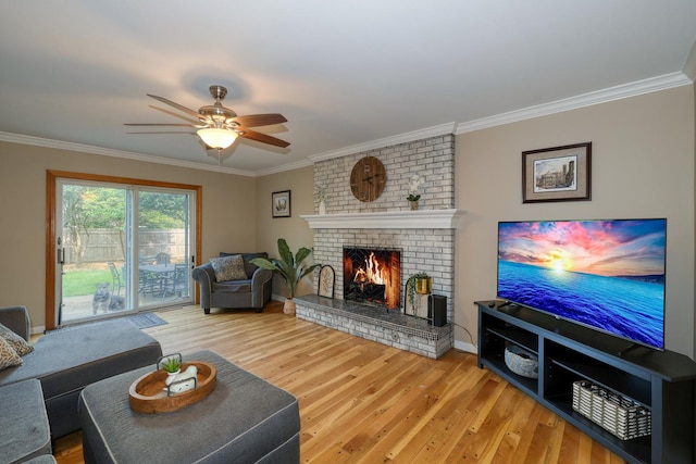 6S503 Bridlespur Dr, Naperville, IL 60540 - living area featuring light wood-style floors, crown molding, a fireplace, and ceiling fan